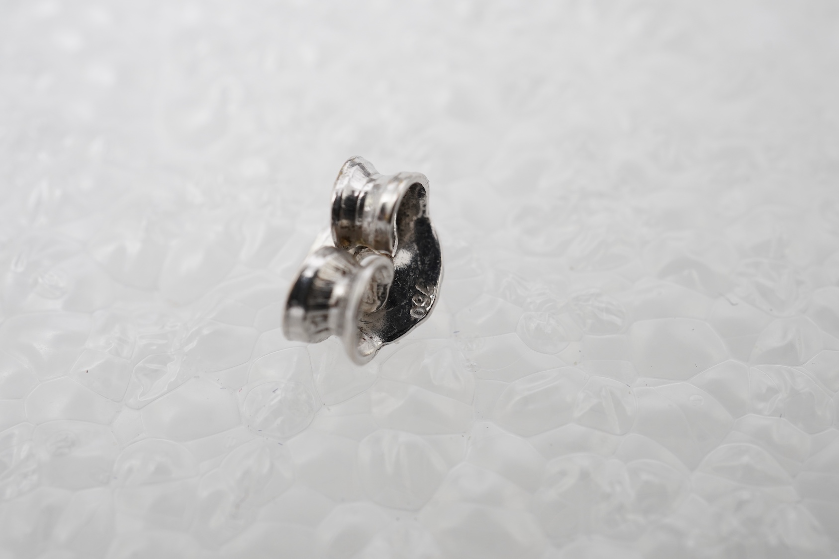 A pair of cultured pearl and diamond earrings